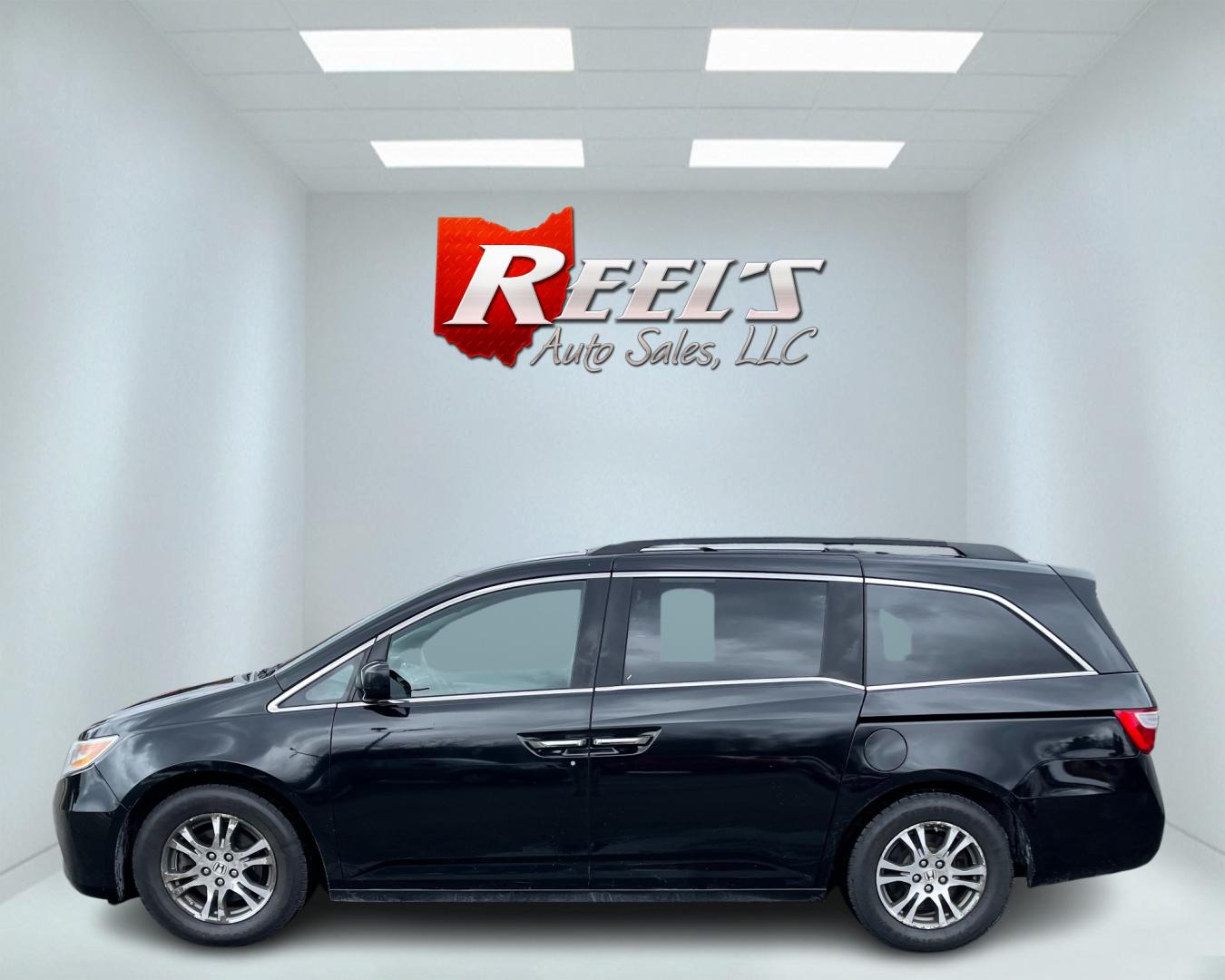 2013 Black /Gray Honda Odyssey EX-L W/ RES (5FNRL5H64DB) with an 3.5L V6 SOHC 24V engine, 5-Speed Automatic transmission, located at 11115 Chardon Rd. , Chardon, OH, 44024, (440) 214-9705, 41.580246, -81.241943 - Photo#9